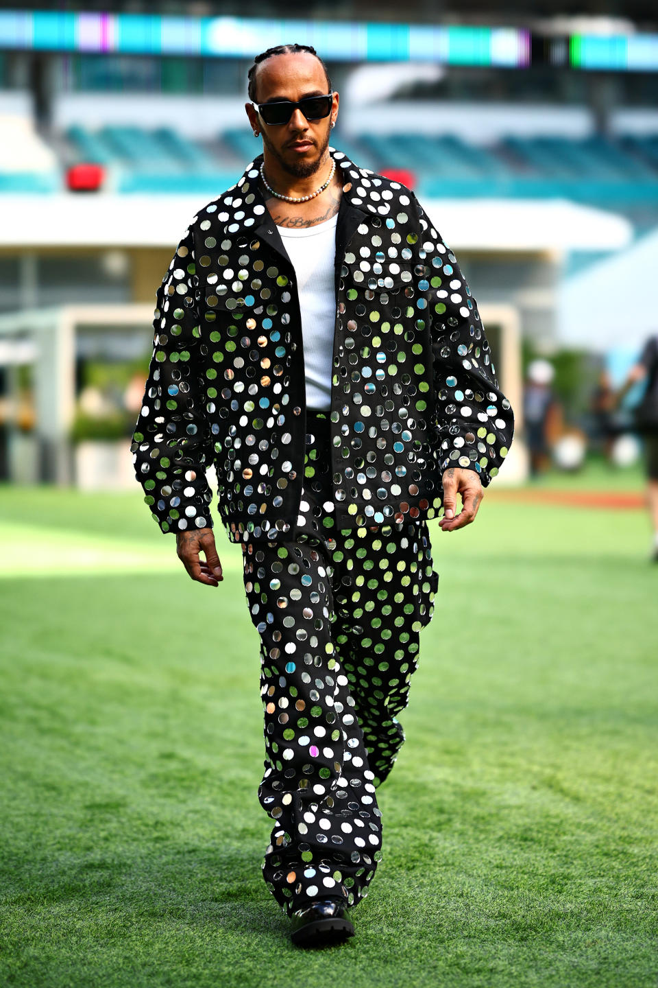 MIAMI, FLORIDA - MAY 04: Lewis Hamilton of Great Britain and Mercedes walks in the Paddock prior to the Sprint ahead of the F1 Grand Prix of Miami at Miami International Autodrome on May 04, 2024 in Miami, Florida. (Photo by Jared C. Tilton - Formula 1/Formula 1 via Getty Images)