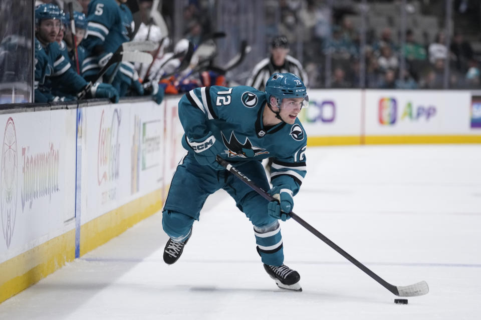 San Jose Sharks left wing William Eklund moves the puck during the second period of the team's NHL hockey game against the New York Islanders in San Jose, Calif., Saturday, March 18, 2023. (AP Photo/Godofredo A. Vásquez)