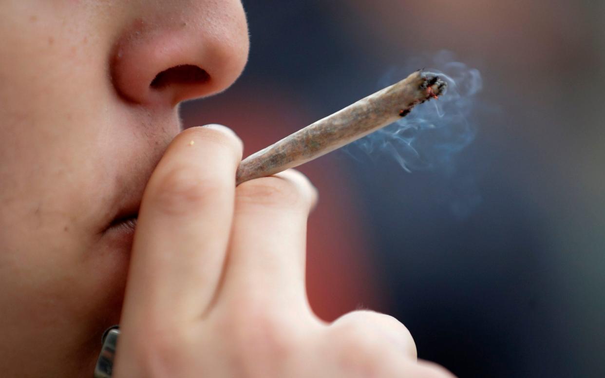 A man smokes a joint  - THOMAS SAMSON/AFP/Getty Images