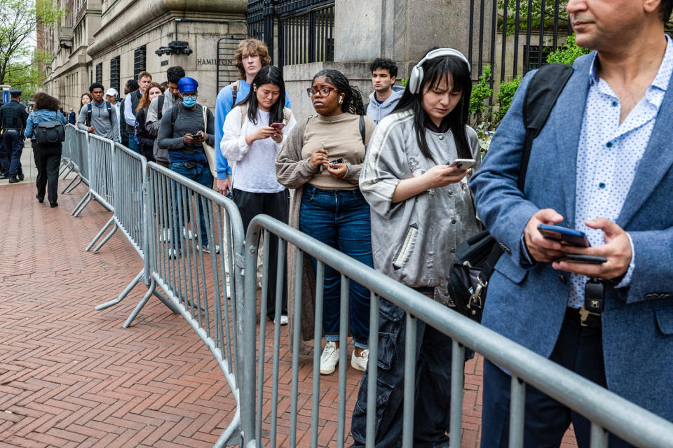 Columbia University students and personnel wait in line (Spencer Platt / Getty Images)