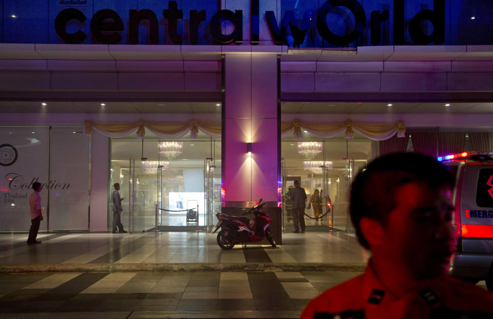 A firefighter enters the lobby of the Central World mall in Bangkok, Thailand, Wednesday, April 10, 2019. The fire had broken out in the Central World mall complex in Thailand's capital, with reports from emergency services saying it has caused a number of fatalities. (AP Photo/Gemunu Amarasinghe)