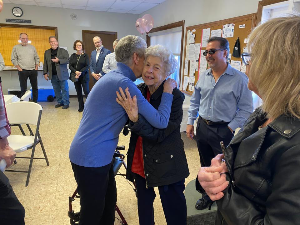 WWII veteran Judith Barstow, center, arrives to her surprise 100th birthday party on Feb. 25, 2024 at Pine Hill Estates in Raynham, two days prior to her actual birthday.