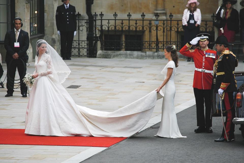 Kate Middleton in an Alexander McQueen gown designed by Sarah Burton with sister Pippa Middleton at her royal wedding to Prince William in London