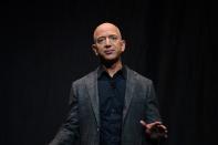 FILE PHOTO: Founder, Chairman, CEO and President of Amazon Jeff Bezos speaks during an event about Blue Origin's space exploration plans in Washington