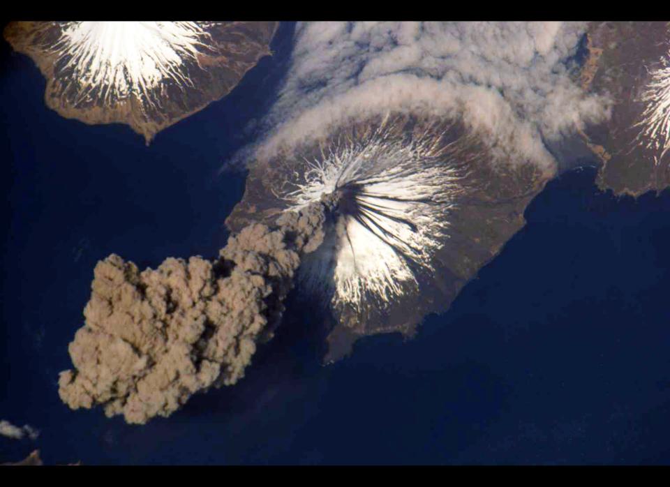  In this photo provided by NASA, The eruption of the Cleveland Volcano is seen as photographed by an Expedition 13 crewmember on the International Space Station May 23, 2009 in the Aleutian Islands, Alaska. The Cleveland Volcano has erupted again yesterday sending a cloud of ash 15,000 feet into the sky according to reports on December 30, 2011. (Photo by NASA via Getty Images)w