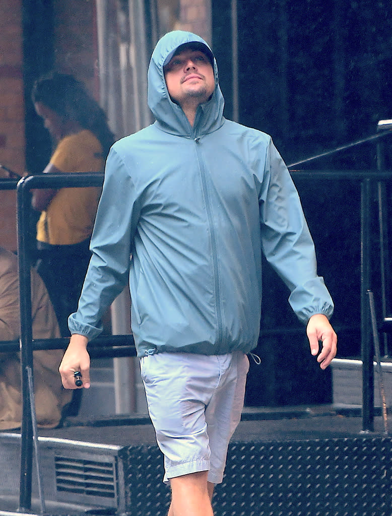 Leo walking and vaping in the rain