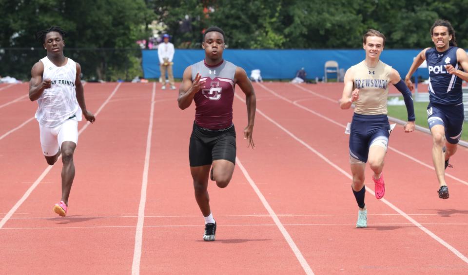 Dayzin Legare from Johnson City competes in the boys 200 meter dash division 2, during the New York State Track and Field Championships at Middletown High School, June 10, 2023.