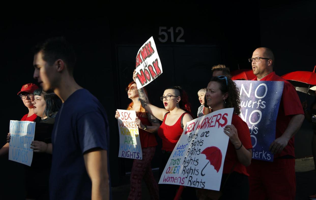 <span class="caption">Supporters of sex workers' rights marched in Las Vegas in 2019.</span> <span class="attribution"><a class="link " href="https://newsroom.ap.org/detail/SexWorkersProtest/00cb17e99298493e8e9ea622e59370fa/photo" rel="nofollow noopener" target="_blank" data-ylk="slk:AP Photo/John Locher;elm:context_link;itc:0;sec:content-canvas">AP Photo/John Locher</a></span>
