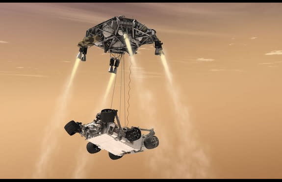 This artist's concept shows the sky-crane maneuver during the descent of NASA's Curiosity rover to the Martian surface, which engineers dubbed "seven minutes of terror." The Mars 2020 mission will leverage the design of this landing system and