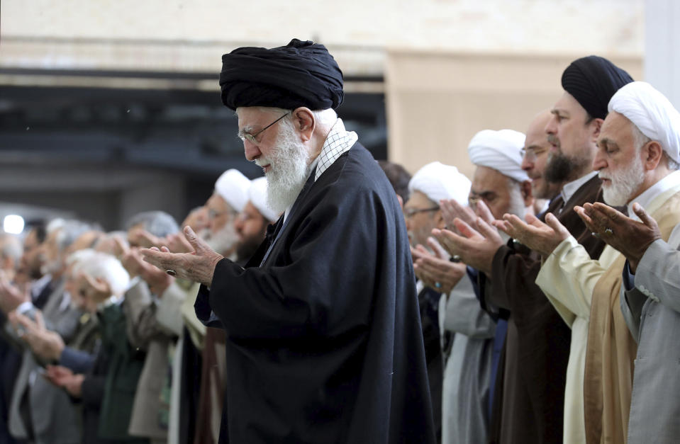 In this photo released by the official website of the office of the Iranian supreme leader, Supreme Leader Ayatollah Ali Khamenei leads Eid al-Fitr prayer marking the end of the Muslims holy fasting month of Ramadan, in Tehran, Iran, Wednesday, April 10, 2024. Ayatollah Khamenei reiterated on Wednesday a promise to retaliate against Israel over the killings of Iranian generals in Syria. (Office of the Iranian Supreme Leader via AP)