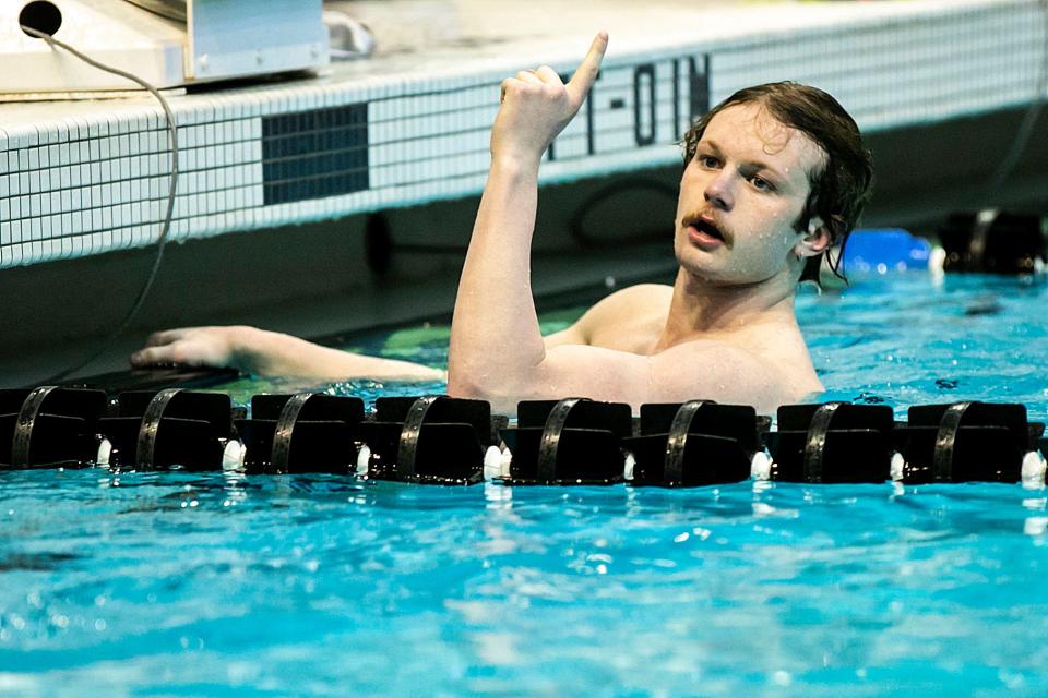 Ankeny's Lance Swanepoel reacts after winning the 50-yard Freestyle during the high school boys state swimming championship on Saturday.