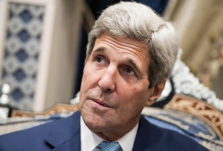 U.S. Secretary of State John Kerry makes a statement before a meeting with Saudi Arabia's foreign minister at King Abdulaziz International Airport in Jeddah September 11, 2014. REUTERS/Brendan Smialowski/Pool