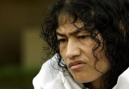 Irom Sharmila Chanu reacts during an interview with Reuters in New Delhi October 4, 2006. REUTERS/Vijay Mathur/Files