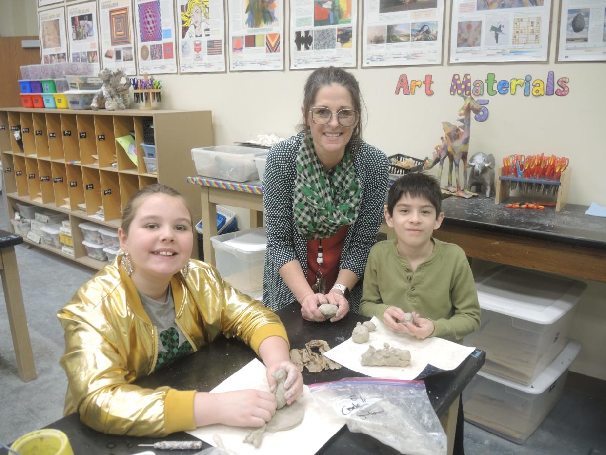 Pictured (from left) are Laila Gunderson, 10, teacher Lori Thompson, and Eli Pereira, 10, in Thompson's ceramics class at the Gaylord Intermediate School. A grant from the Otsego Community Foundation and support from the school's parent teacher organization helped to acquire a kiln for the class.