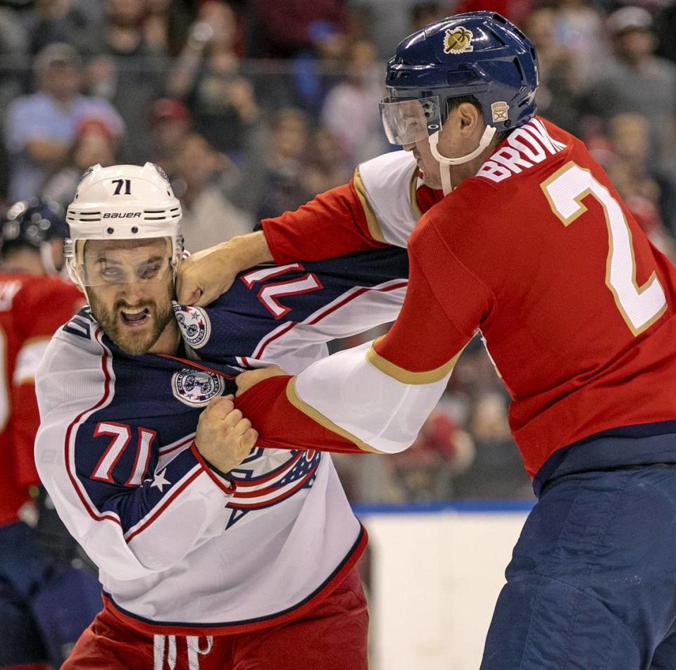 Florida Panthers defenseman Josh Brown (2) punches Columbus Blue Jackets left wing Nick Foligno (71) during fight on the ice in the first period as the Florida Panthers host the Columbus Blue Jackets at the BB&T Center in Sunrise on Saturday, December 7, 2019.