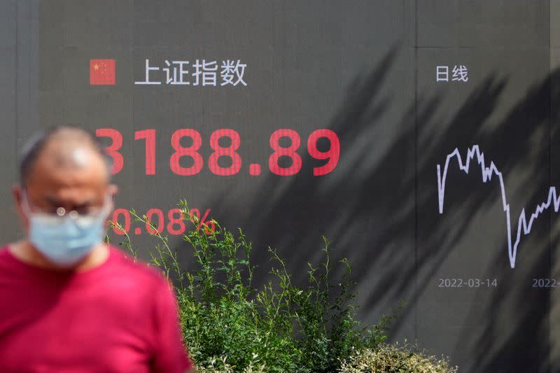 FILE PHOTO: Display of stock information in Shanghai