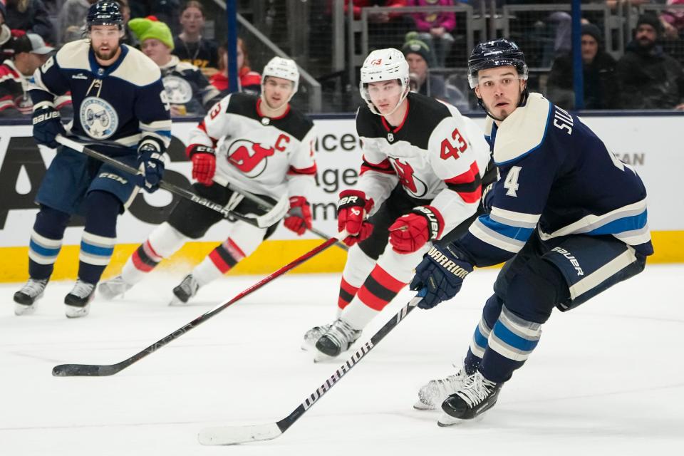 Jan 19, 2024; Columbus, Ohio, USA; Columbus Blue Jackets center Cole Sillinger (4) watches the puck during the second period of the NHL hockey game against the New Jersey Devils at Nationwide Arena.