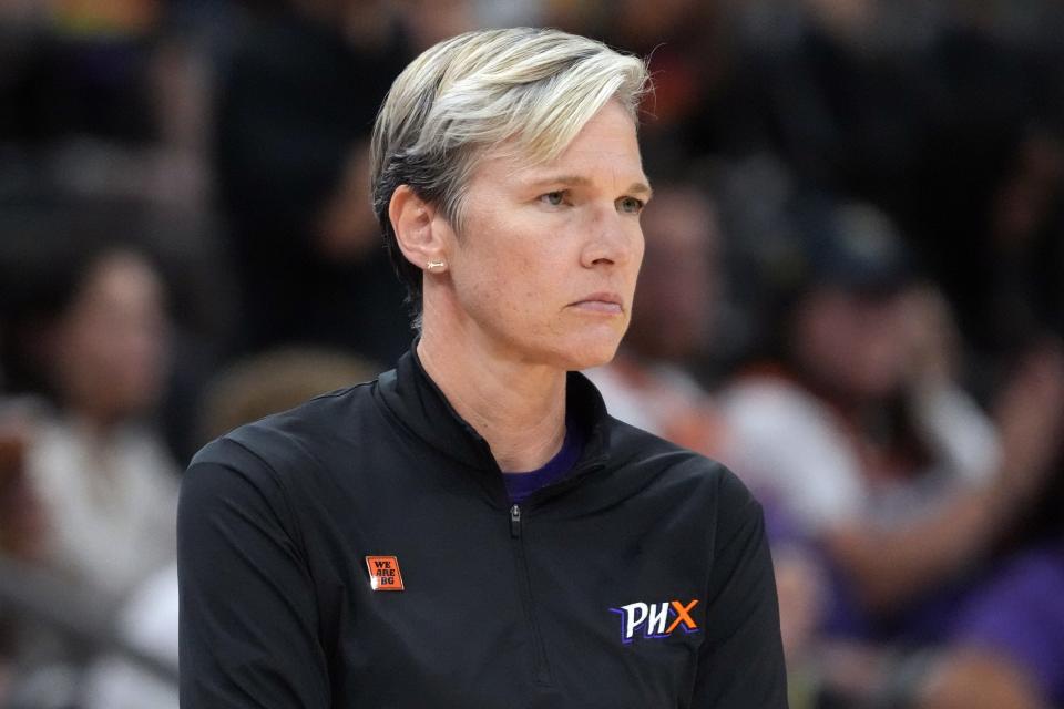 Mercury head coach Vanessa Nygaard coaches her team during a recent game against the Fever while wearing a "We Are BG" pin in support of Mercury center Brittney Griner.