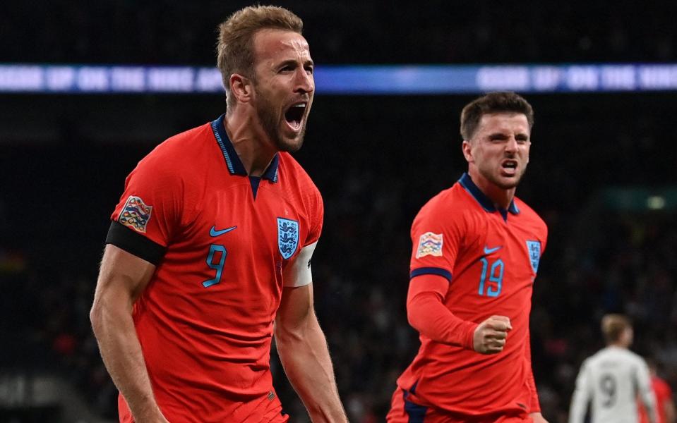 England's striker Harry Kane (L) celebrates scoring the team's third goal with England's midfielder Mason Mount during the UEFA Nations League group A3 football match between England and Germany at Wembley stadium in north London on September 26, 2022 - Getty Images/Glyn Kirk