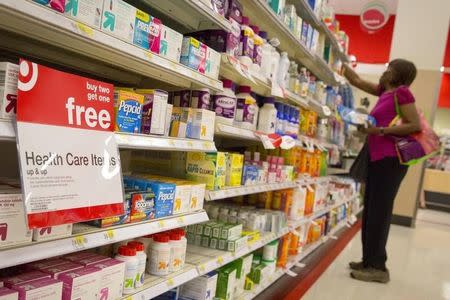 A customer shops in the pharmacy department of a Target store in the Brooklyn borough of New York June 15, 2015. REUTERS/Brendan McDermid