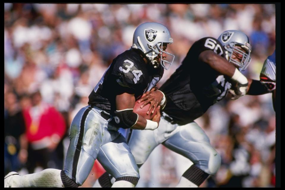 13 Jan 1991: Running back Bo Jackson of the Los Angeles Raiders runs down the field during a playoff game against the Cinicinnati Bengals at the Los Angeles Coliseum in Los Angeles, California. The Raiders won the game 20-10.