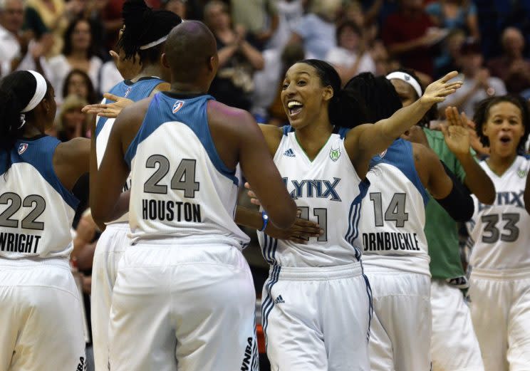 Candice Wiggins celebrates a win in 2011. (AP)