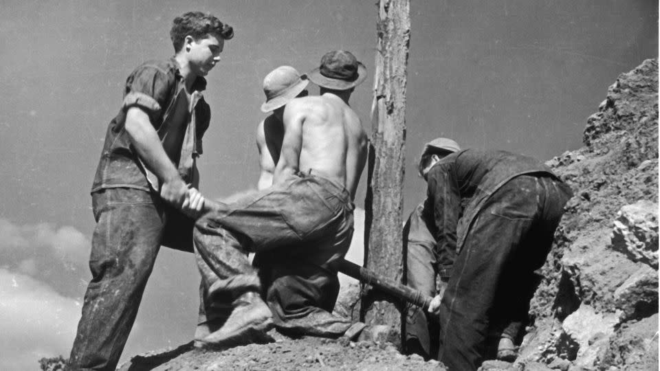 Boys at work at a Civilian Conservation Corps (CCC) camp at the Beltsville Agricultural Research Center, Maryland, circa 1935. The CCC was a public work relief program for unemployed men, providing vocational training through the performance of useful work related to conservation and development of natural resources in the US from 1933 to 1942.  - Fotosearch/Getty Images