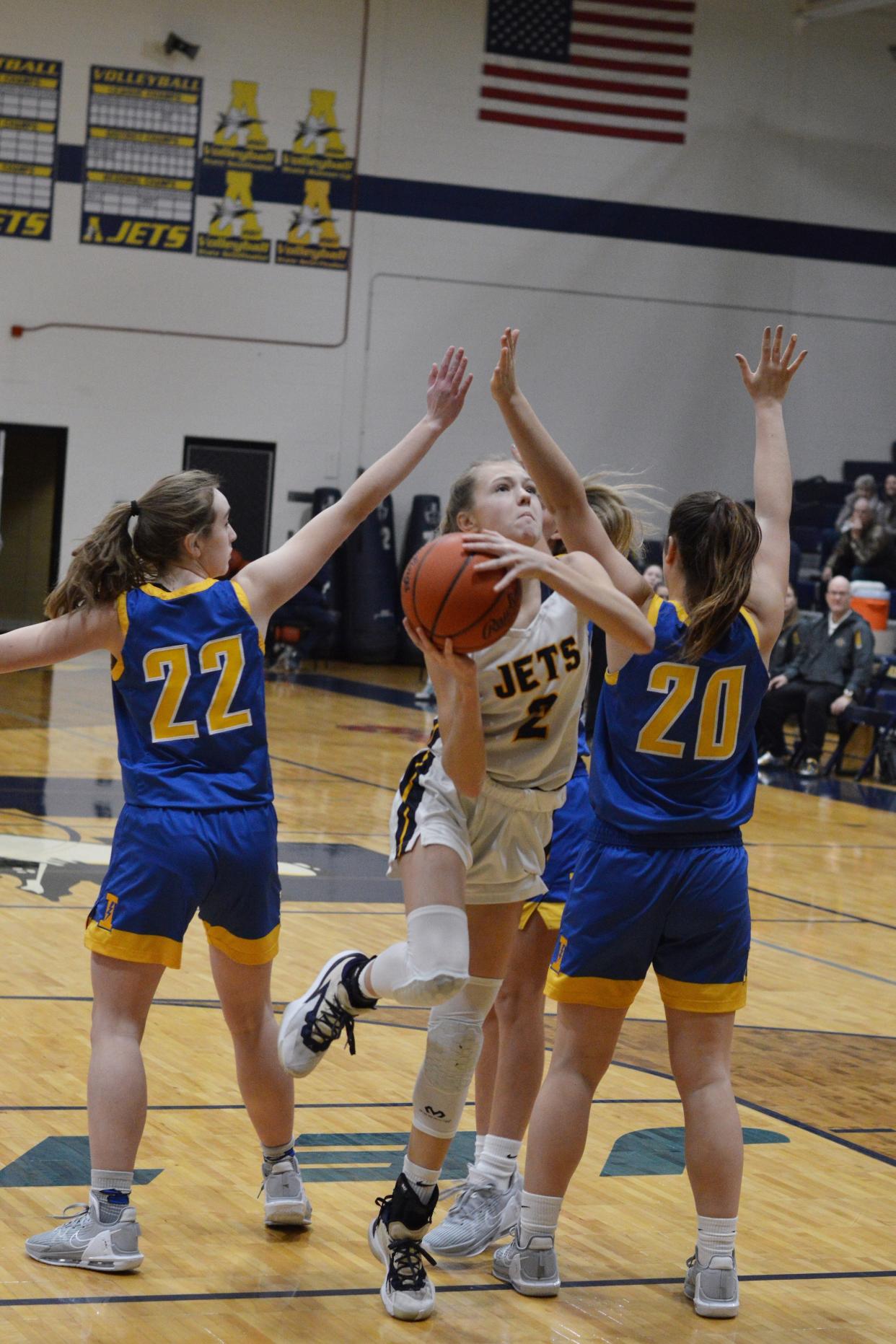 Airport's Olivia Gratz cuts inside for a basket against Ida during the Airport Showcase on Thursday, Dec. 29, 2022.