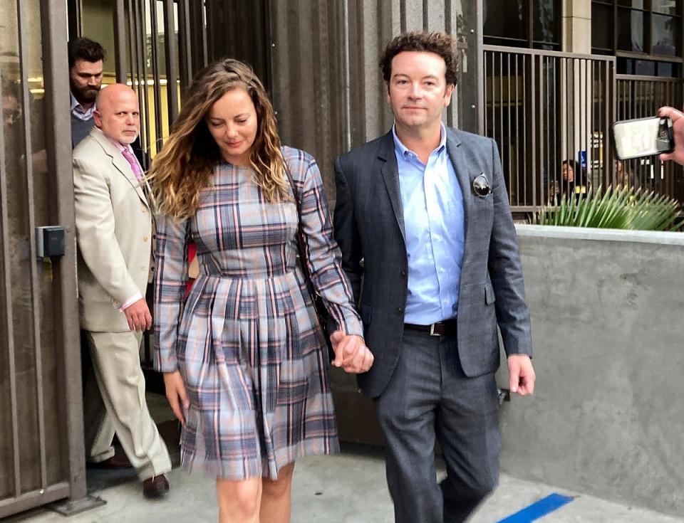 Danny Masterson leaves Los Angeles superior Court with his wife Bijou Phillips in November, 2022. (Copyright 2022 The Associated Press. All rights reserved)