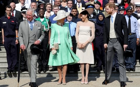 Charles, Camilla, Meghan and Harry pose for a photograph - Credit: Chris Jackson