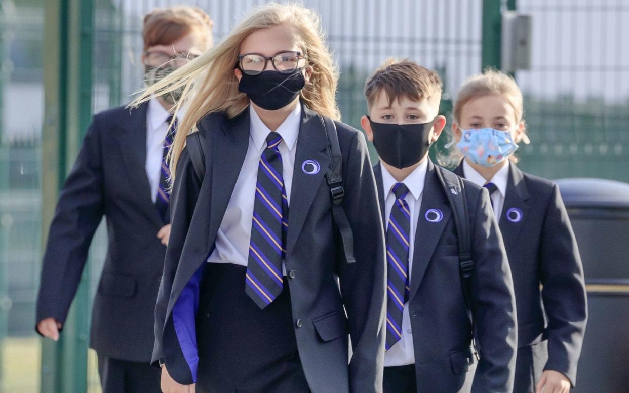 Pupils at a school in Doncaster wearing face masks as they returned to the classroom in September -  Danny Lawson/PA Wire