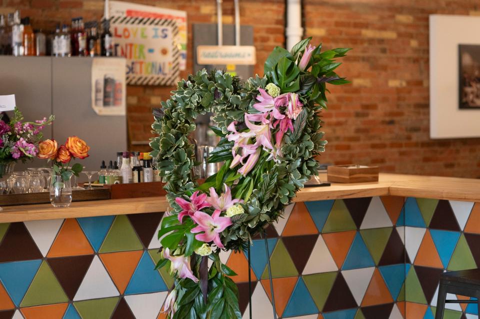 Flowers left at Café Rica in downtown Battle Creek on Tuesday, Feb. 20, 2024.