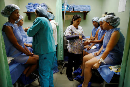 Women prepare for sterilization surgery at a hospital in Caracas, Venezuela July 27, 2016. REUTERS/Carlos Garcia Rawlins