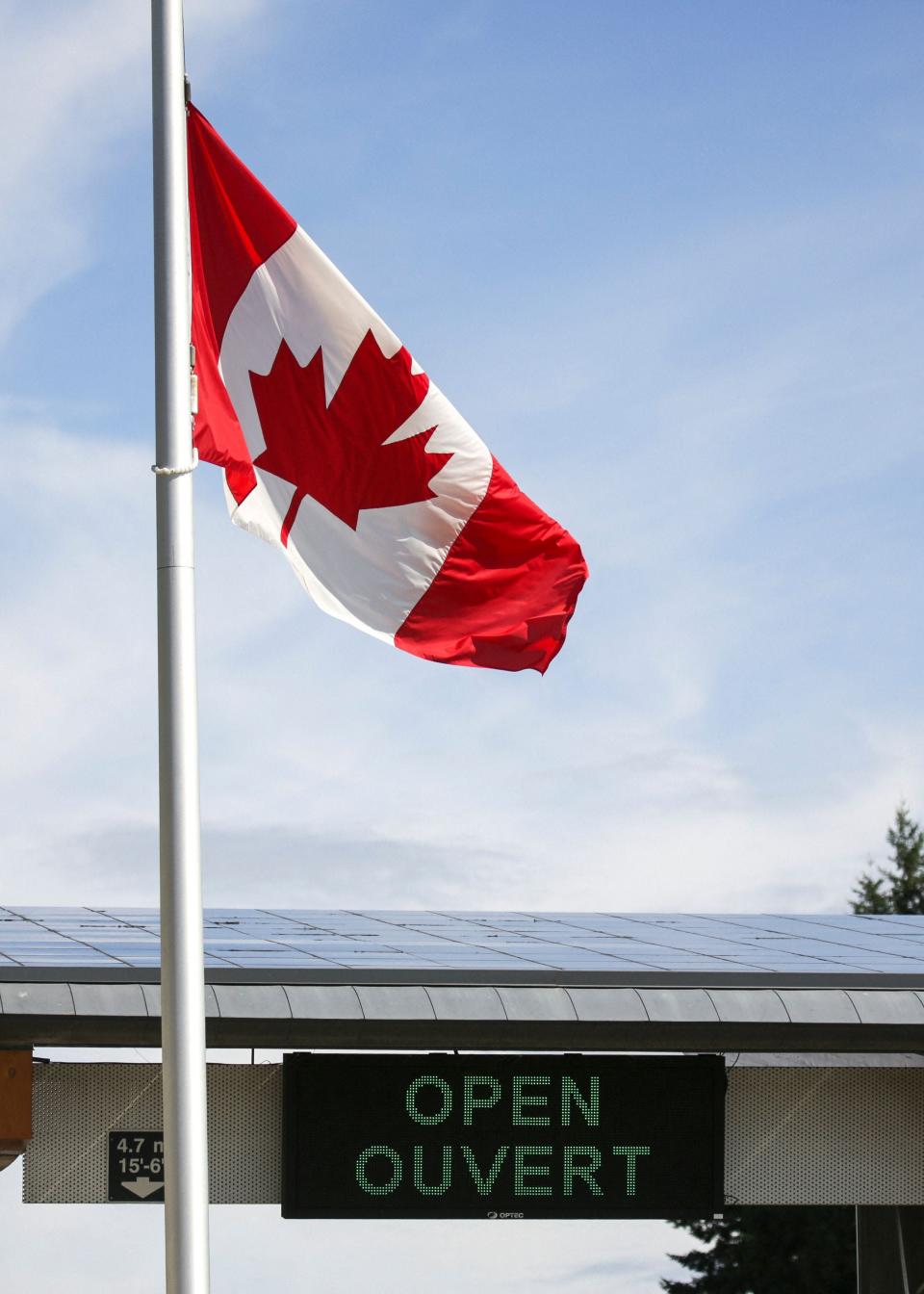 A Canadian national flag at a border crossing between the U.S. and Canada.