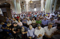 Egyptians saying prayers for the dead at al Thawrah Mosque in Cairo, May 20, 2016. (AP Photo/Amr Nabil)