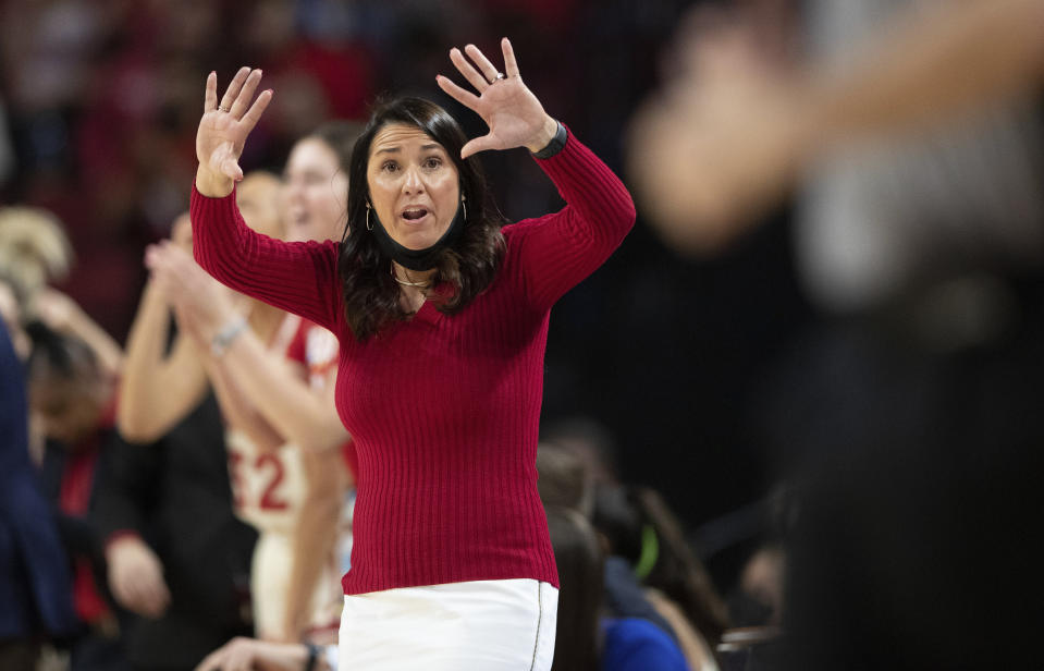 FILE - Nebraska head coach Amy Williams yells from the sideline during the second half of an NCAA college basketball game against Indiana on Monday, Feb. 14, 2022, in Lincoln, Neb. The women's basketball teams in Nebraska are showing it's not just a volleyball state. The Nebraska Cornhuskers of Lincoln and Creighton Bluejays of Omaha both entered the season ranked in the Associated Press preseason Top 25. (AP Photo/Rebecca S. Gratz, File)