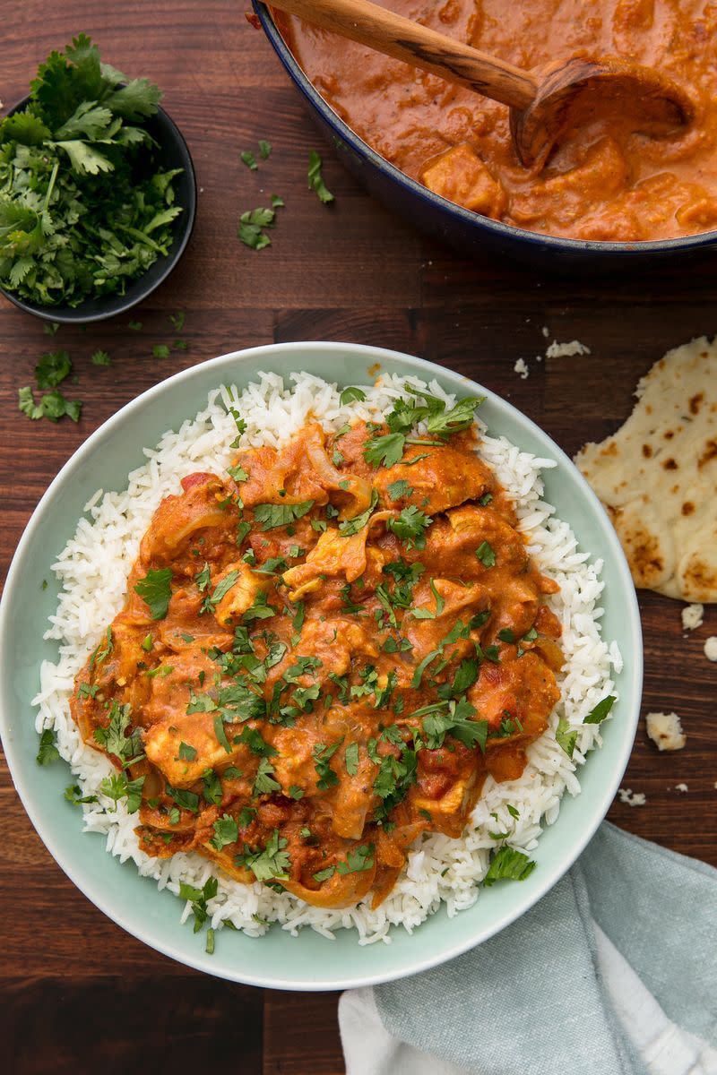 <p>Use the half hour you would have spent waiting for a lukewarm takeaway to make your favourite Indian at home instead.</p><p>Get the <a href="https://www.delish.com/uk/cooking/recipes/a29770946/easy-indian-butter-chicken-recipe/" rel="nofollow noopener" target="_blank" data-ylk="slk:Indian Butter Chicken;elm:context_link;itc:0;sec:content-canvas" class="link ">Indian Butter Chicken</a> recipe.</p>