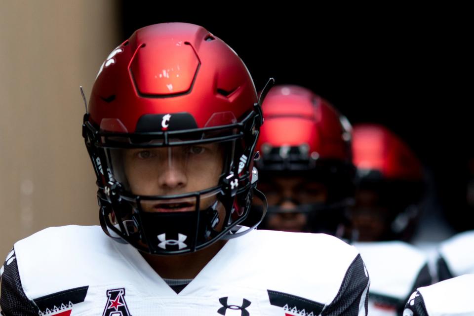 Cincinnati Bearcats quarterback Desmond Ridder (9) walks onto the field before the NCAA football game between the Cincinnati Bearcats and the Notre Dame Fighting Irish on Saturday, Oct. 2, 2021, at Notre Dame Stadium in South Bend, Ind. 