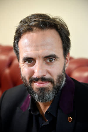 Jose Naves CEO of online fashion house Farfetch poses for a portrait at the company headquarters in London, Britain January 31, 2018. REUTERS/Toby Melville