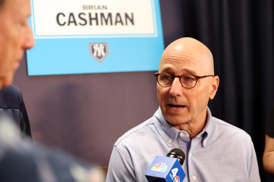 Yankees general manager Brian Cashman talks with media at George M. Steinbrenner Field during spring training.