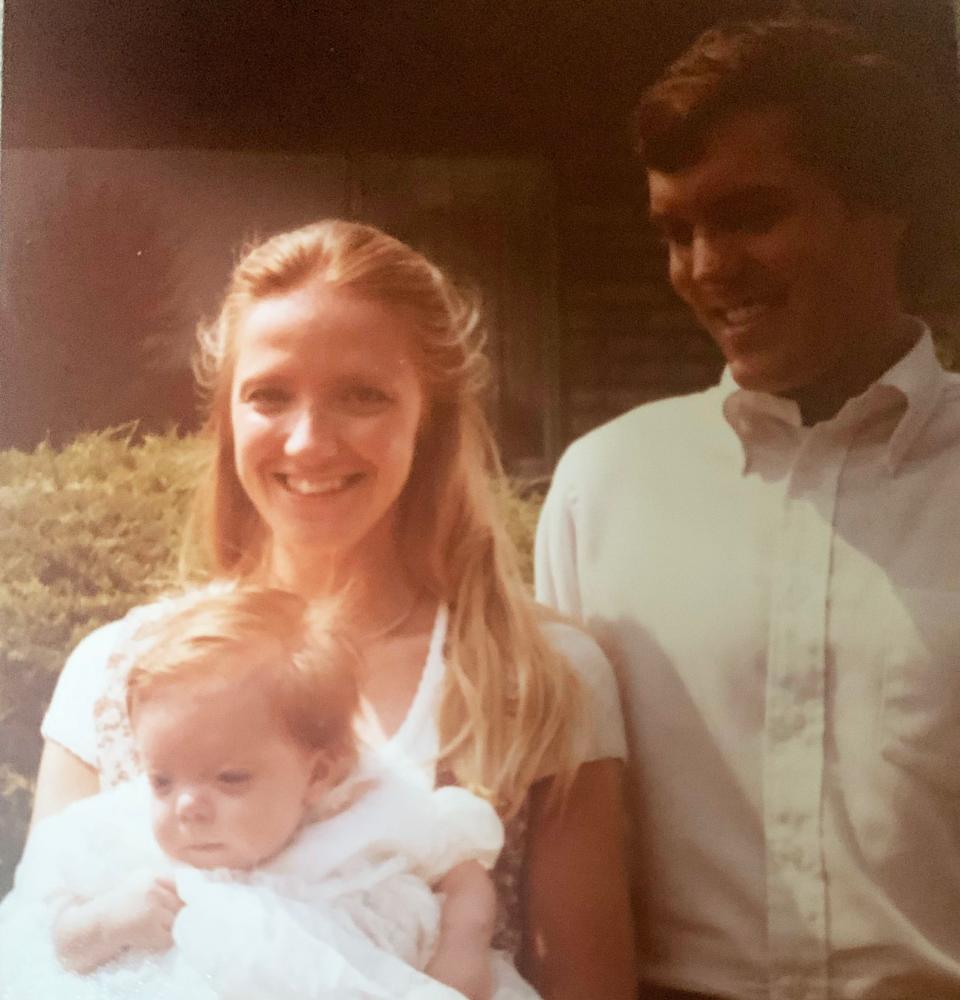 The Krauseneck family - Cathy and James with Sara as a baby.