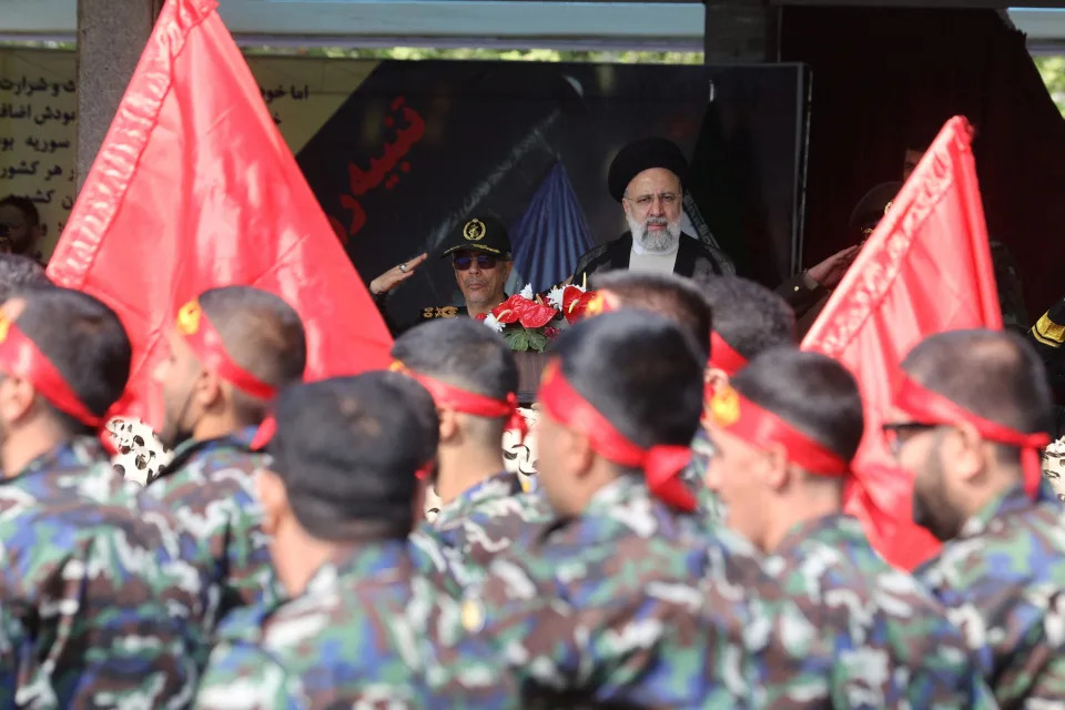 Iranian President Ebrahim Raisi looks at members of the armed forces during the National Army Day parade ceremony in Tehran, Iran, April 17, 2024. / Credit: Majid Asgaripour/WANA/REUTERS