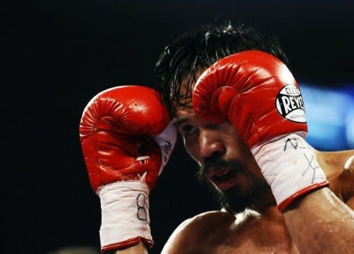 Manny Pacquiao during a boxing fight in November 2011. Pacquiao's promoter Bob Arum said the next time the Filipino superstar steps into the ring it won't be against unbeaten American Floyd Mayweather