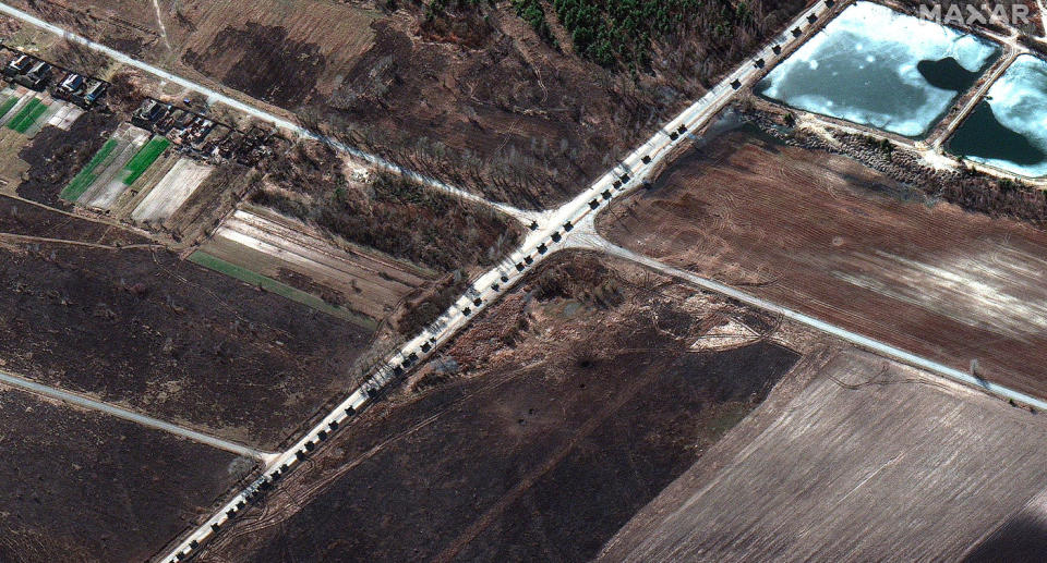 This satellite image provided by Maxar Technologies shows military convoy northwest of Invankiv, Ukraine on Monday. Source: Maxar Technologies via AP