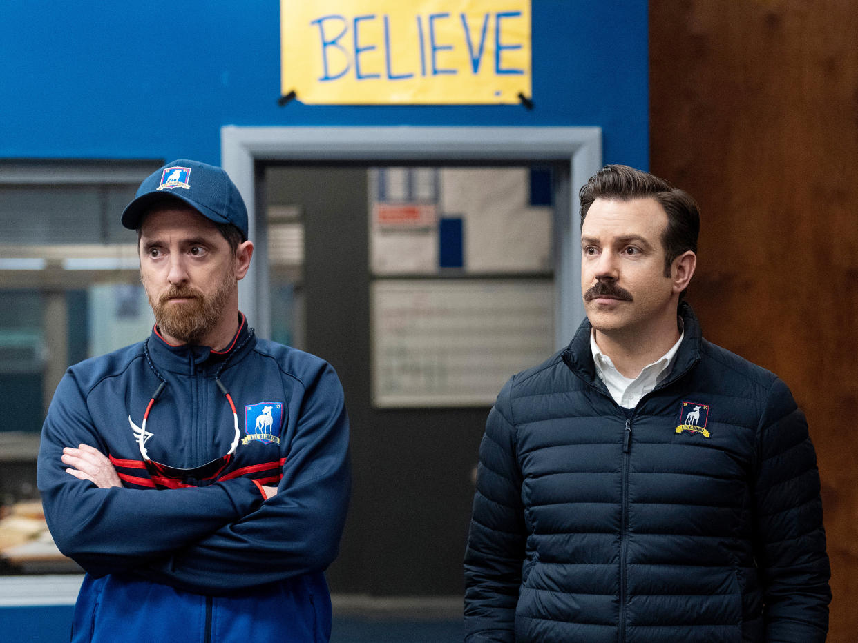 Brendan Hunt as Coach Beard and Jason Sudeikis as Ted Lasso. (Colin Hutton / Apple TV+)