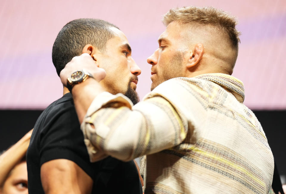 LAS VEGAS, NEVADA - JULY 06: (L-R) Opponents Robert Whittaker of New Zealand and Dricus Du Plessis of South Africa face off during the UFC 290 press conference at T-Mobile Arena on July 06, 2023 in Las Vegas, Nevada. (Photo by Chris Unger/Zuffa LLC via Getty Images)
