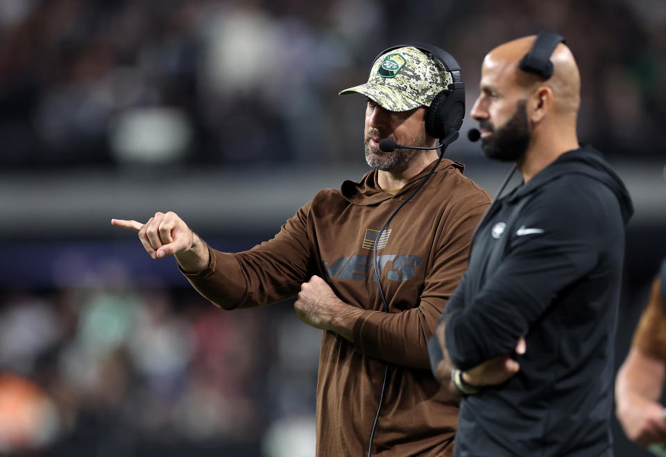 LAS VEGAS, NEVADA - NOVEMBER 12:  Quarterback Aaron Rodgers #8 of the New York Jets talks with head coach Robert Saleh on the sidelines during the 1st half of the game against the Las Vegas Raiders at Allegiant Stadium on November 12, 2023 in Las Vegas, Nevada. (Photo by Sean M. Haffey/Getty Images)