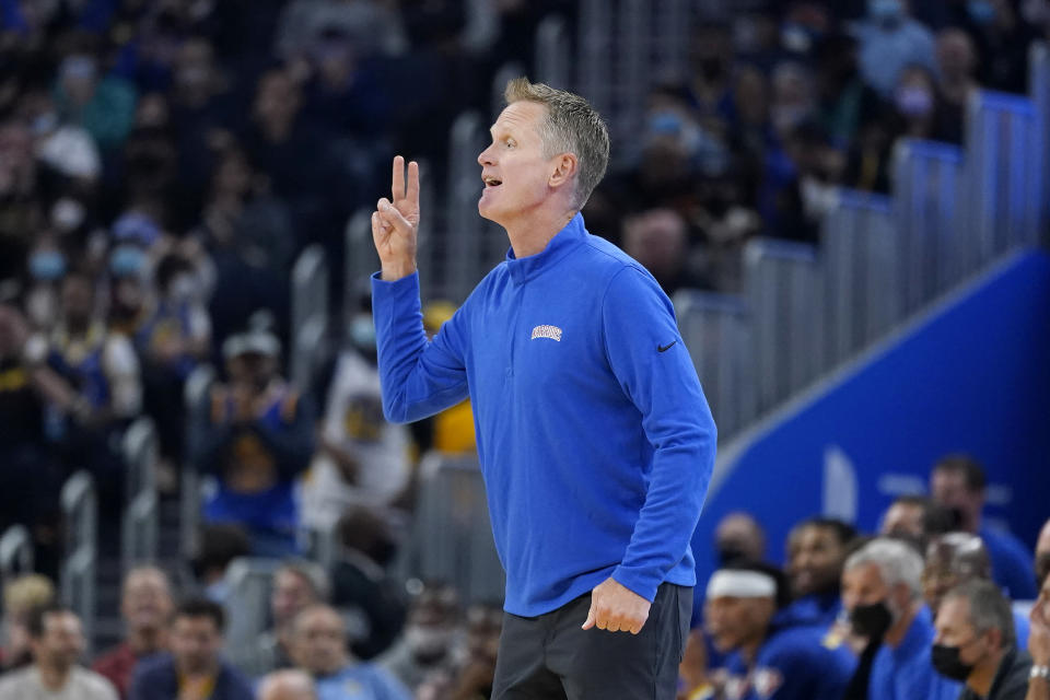 Golden State Warriors head coach Steve Kerr gestures toward players during the first half of his team's NBA basketball game against the Memphis Grizzlies in San Francisco, Thursday, Oct. 28, 2021. (AP Photo/Jeff Chiu)