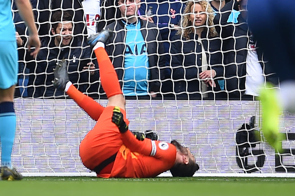 Loris after landing awkwardly. (Photo by Glyn KIRK / AFP) 