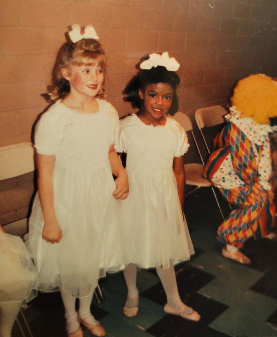 Sarah Taylor, right, is seen in costume with a fellow dancer as some of the supporting Claras (not the lead dancer herself) in the Southold Dance Theater's production of "The Nutcracker" in South Bend. Now an adult, Taylor currently serves as Southold's executive director.